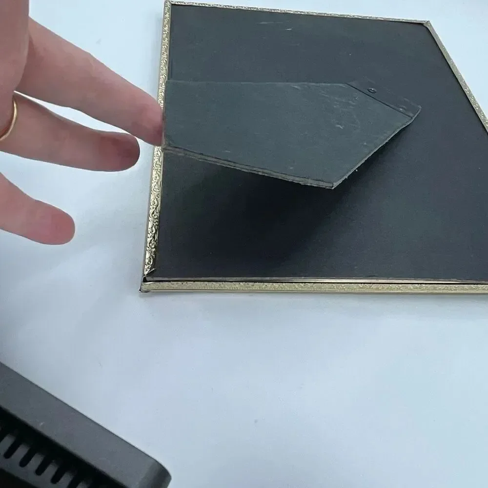 Vintage goldtone 8”X10” picture frame.